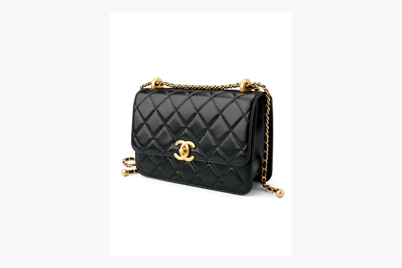 Chanel Black Quilted Chain Flap Bag shopping brief photo showing black quilted leather flap body, gold chain strap, CC front logo, rectangular shoulder-bag shape, and polished hardware thumbnail 5