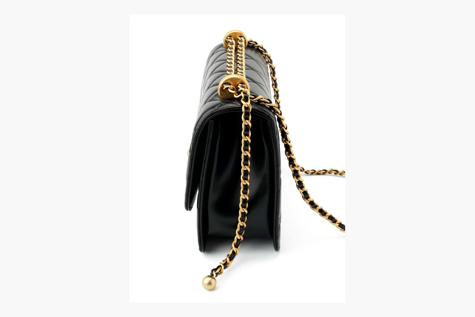 Chanel Black Quilted Chain Flap Bag shopping brief photo showing black quilted leather flap body, gold chain strap, CC front logo, rectangular shoulder-bag shape, and polished hardware thumbnail 6