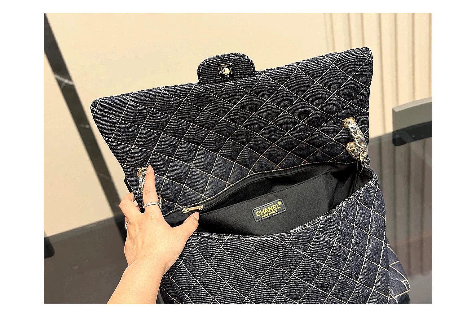 Chanel Quilted Flap Bag Black Denim shopping brief photo showing black denim-look quilted flap body, shoulder-bag shape, chain strap, and polished hardware thumbnail 2