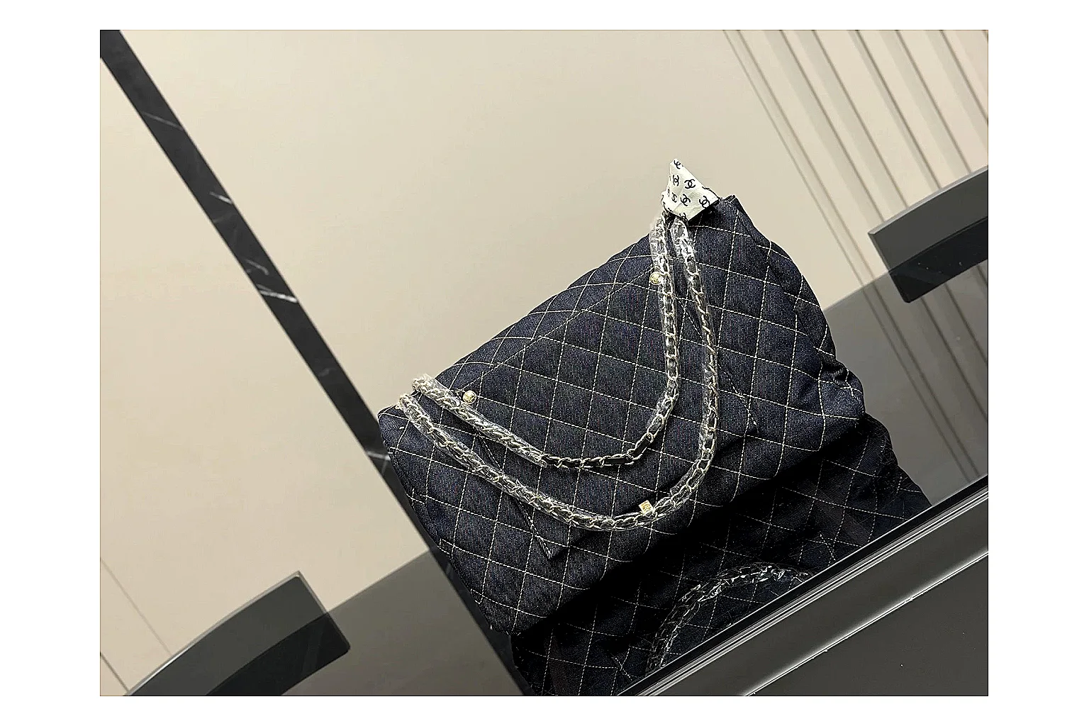 Chanel Quilted Flap Bag Black Denim shopping brief photo showing black denim-look quilted flap body, shoulder-bag shape, chain strap, and polished hardware thumbnail 3