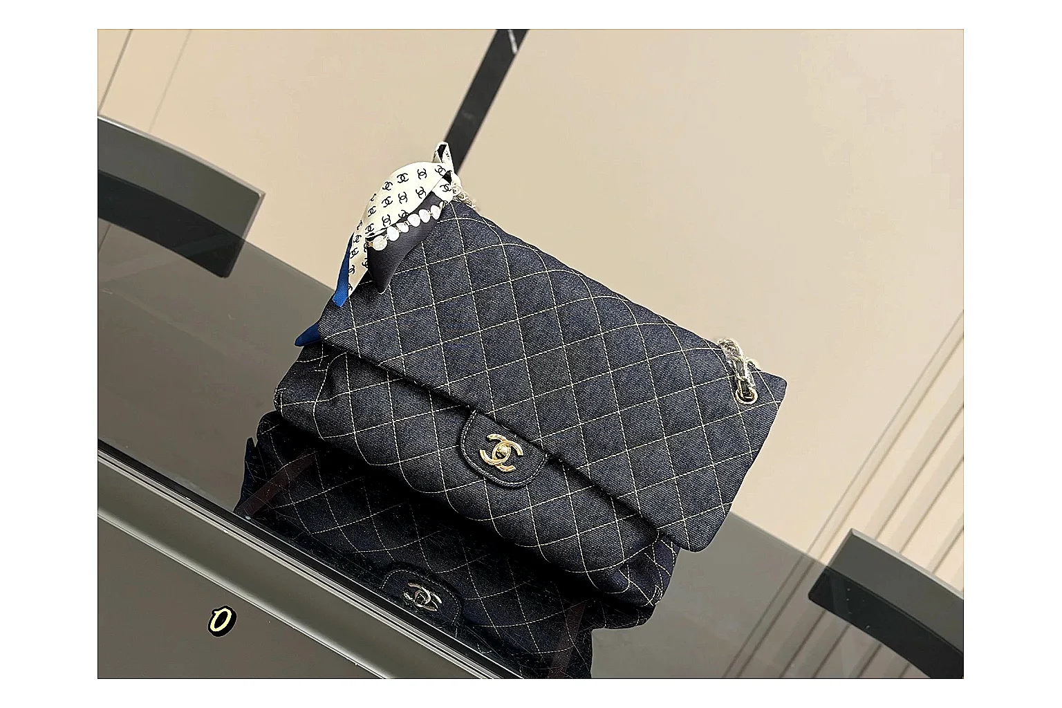 Chanel Quilted Flap Bag Black Denim shopping brief photo showing black denim-look quilted flap body, shoulder-bag shape, chain strap, and polished hardware thumbnail 4