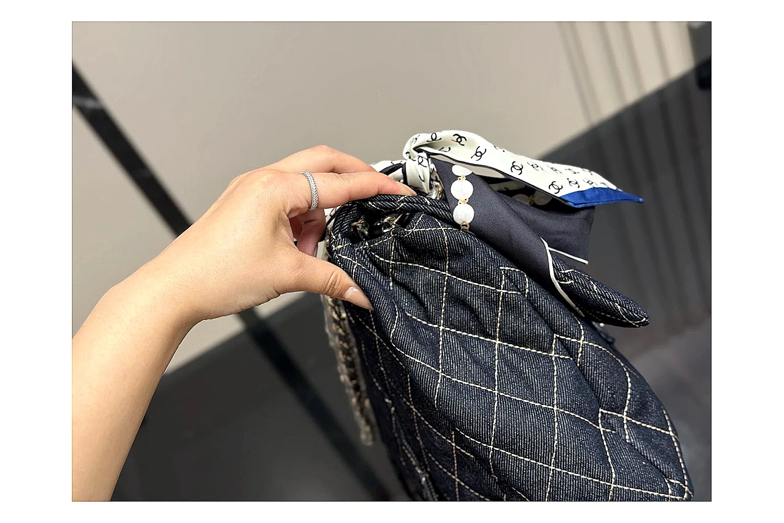 Chanel Quilted Flap Bag Black Denim shopping brief photo showing black denim-look quilted flap body, shoulder-bag shape, chain strap, and polished hardware thumbnail 6