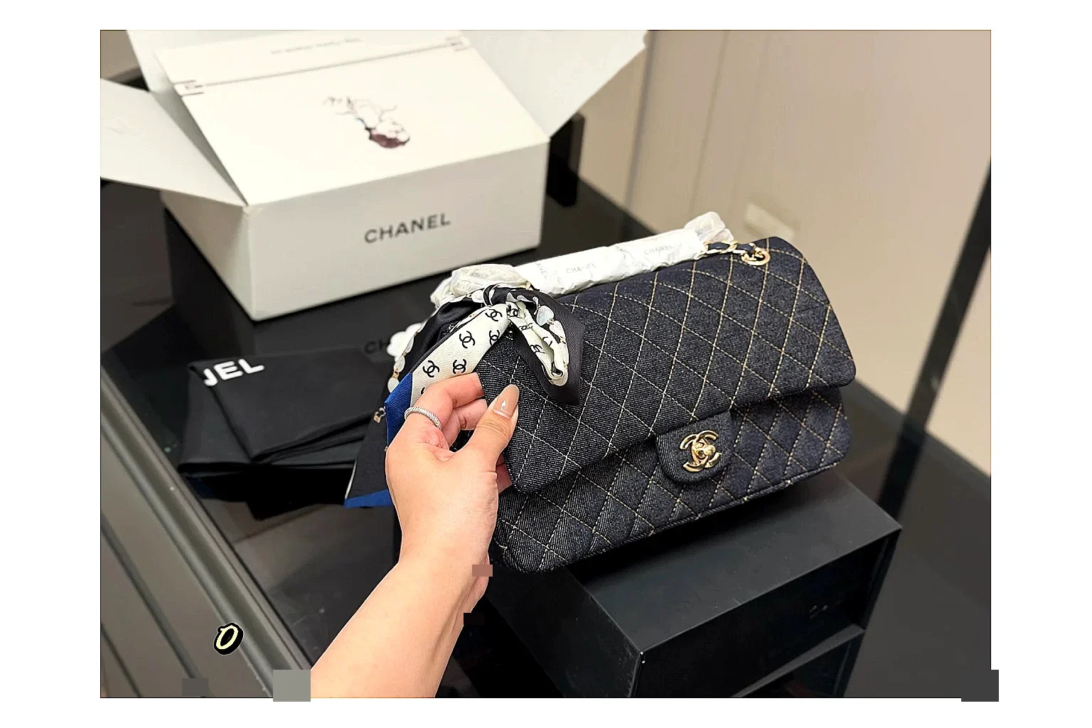 Chanel Quilted Flap Bag Black Navy shopping brief photo showing black navy quilted leather body, flap structure, chain strap, and polished luxury hardware