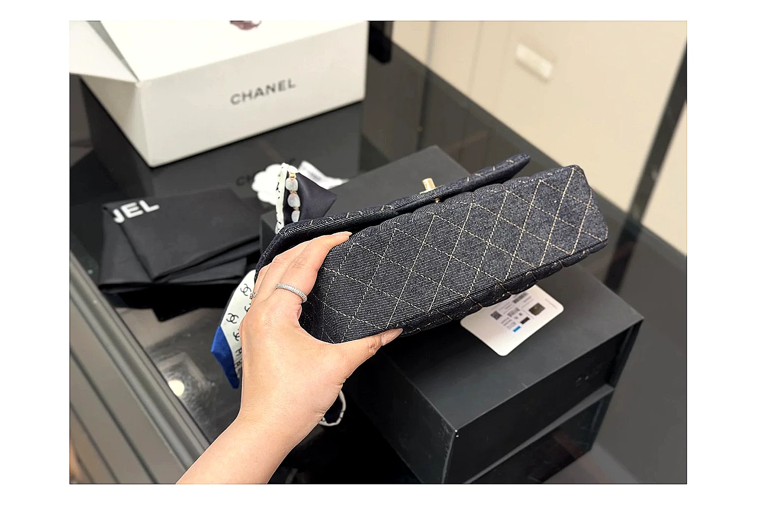 Chanel Quilted Flap Bag Black Navy shopping brief photo showing black navy quilted leather body, flap structure, chain strap, and polished luxury hardware thumbnail 3