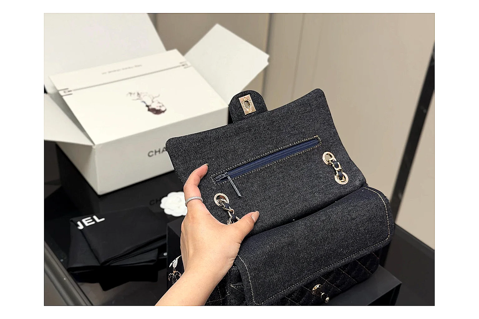Chanel Quilted Flap Bag Black Navy shopping brief photo showing black navy quilted leather body, flap structure, chain strap, and polished luxury hardware thumbnail 5