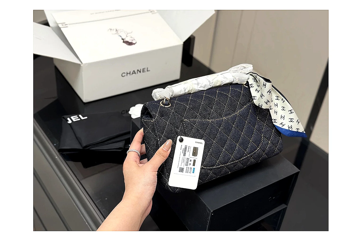 Chanel Quilted Flap Bag Black Navy shopping brief photo showing black navy quilted leather body, flap structure, chain strap, and polished luxury hardware thumbnail 6