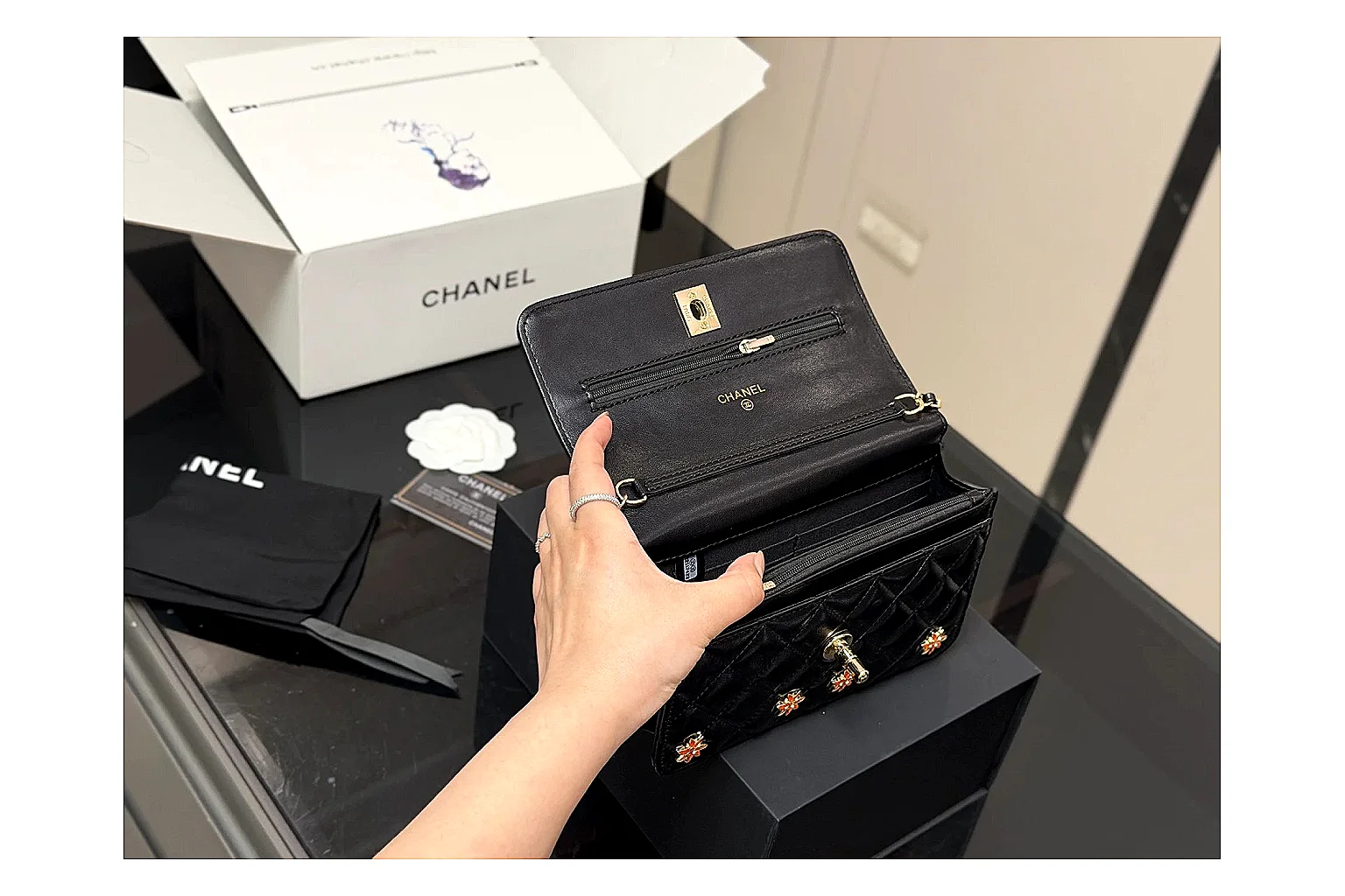 Chanel Quilted Wallet Bag Black Floral shopping brief photo showing black quilted wallet-bag body, floral detail, compact flap shape, and polished chain hardware thumbnail 5