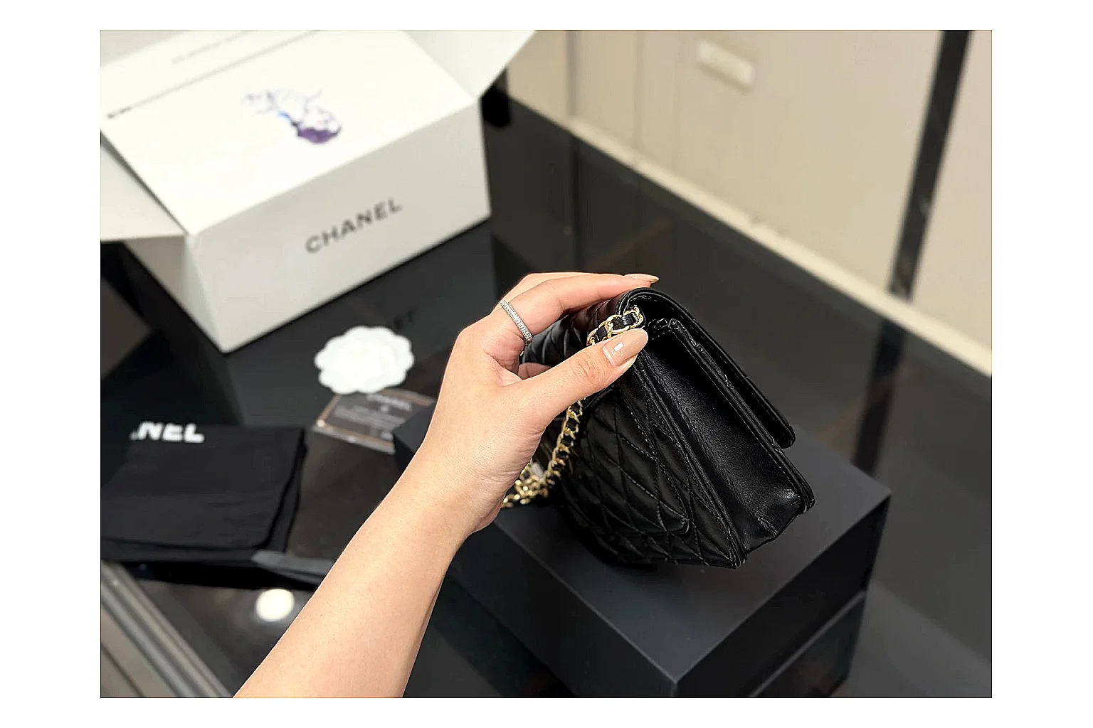 Chanel Quilted Wallet Bag Black Floral shopping brief photo showing black quilted wallet-bag body, floral detail, compact flap shape, and polished chain hardware thumbnail 6
