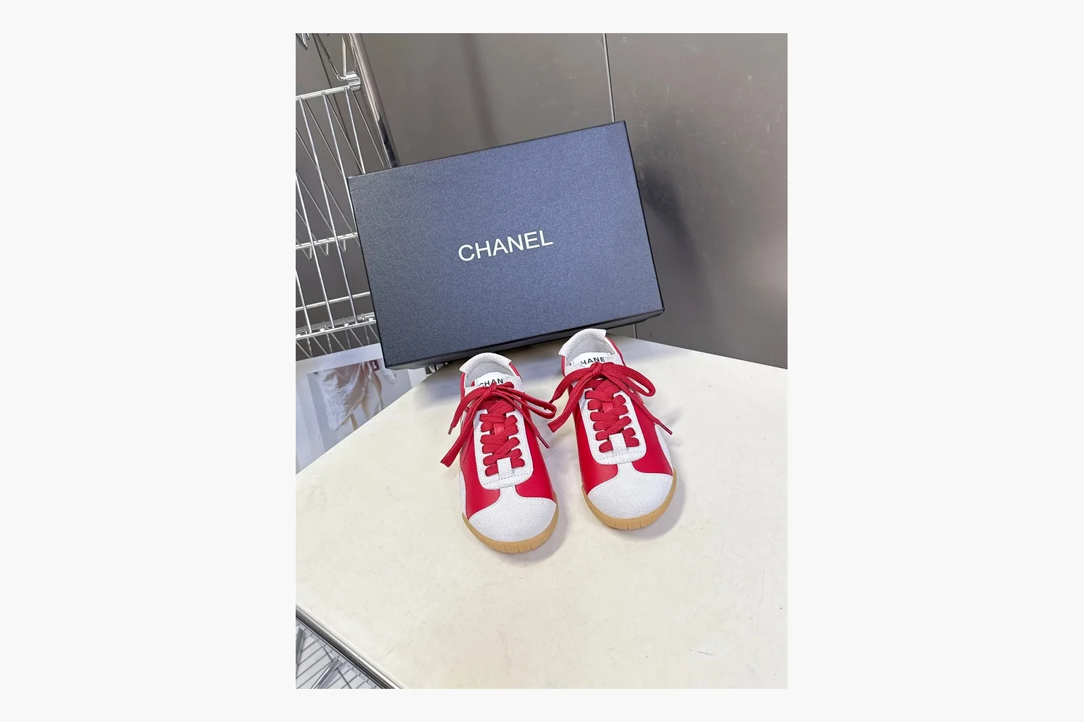 Chanel Red White Platform Sneaker shopping brief photo showing red and white low-top upper, platform sole, leather-suede panel mix, box views, and rounded casual sneaker shape