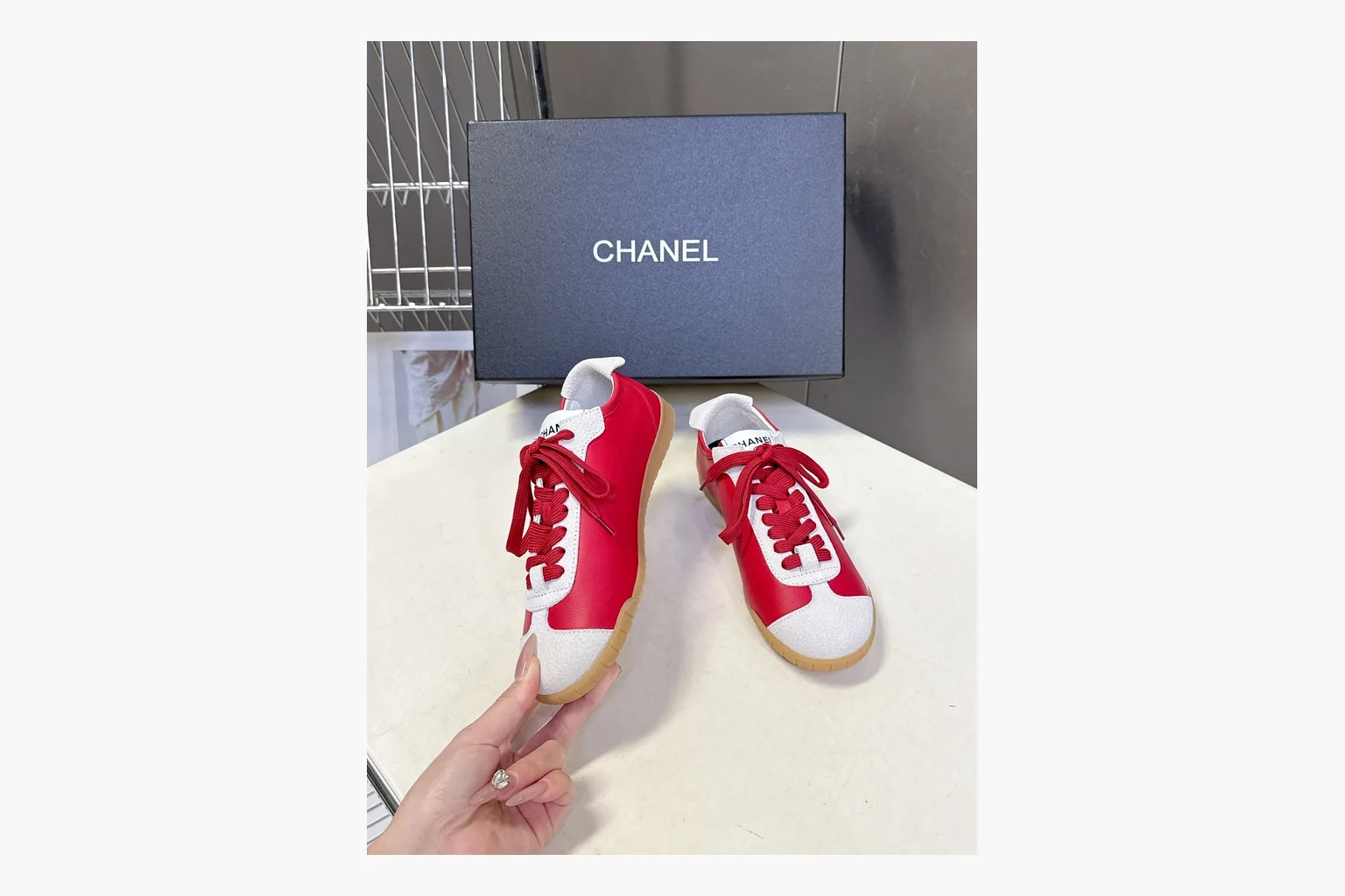 Chanel Red White Platform Sneaker shopping brief photo showing red and white low-top upper, platform sole, leather-suede panel mix, box views, and rounded casual sneaker shape thumbnail 5