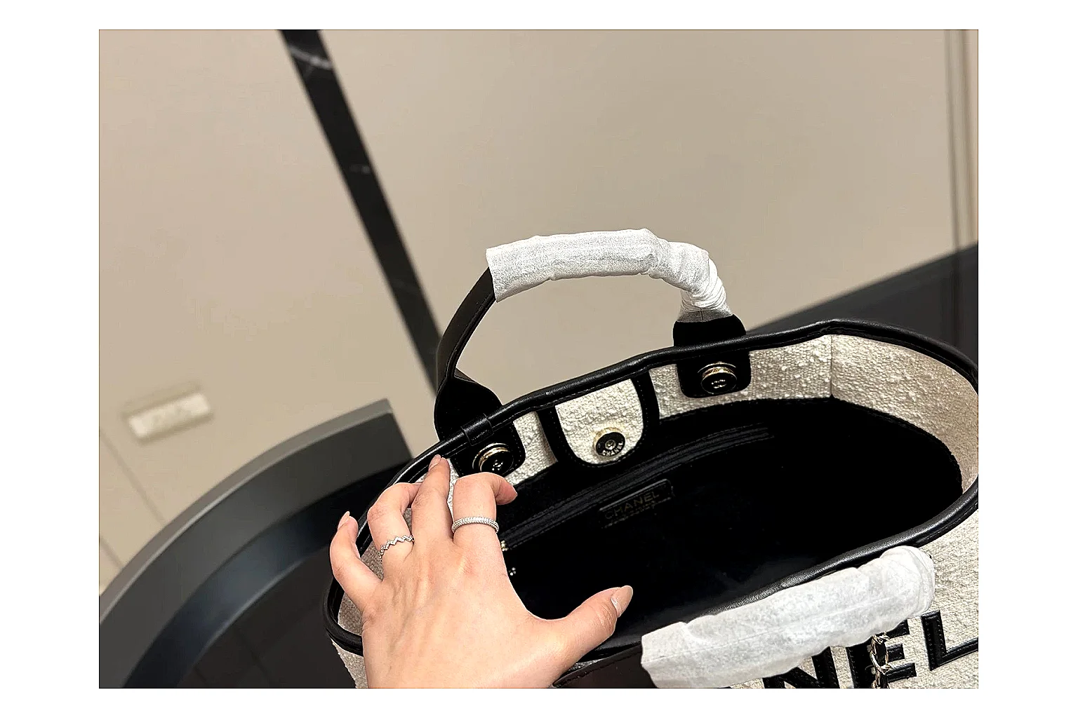 Chanel Tote Bag White Black shopping brief photo showing white black canvas-leather tote body, open carry shape, structured handles, and branded luxury-bag details thumbnail 2