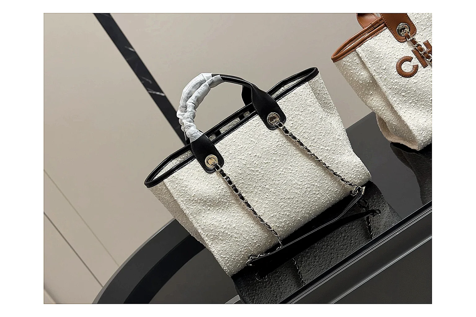 Chanel Tote Bag White Black shopping brief photo showing white black canvas-leather tote body, open carry shape, structured handles, and branded luxury-bag details thumbnail 3