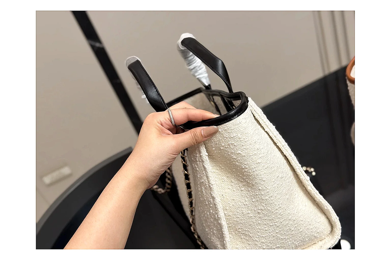 Chanel Tote Bag White Black shopping brief photo showing white black canvas-leather tote body, open carry shape, structured handles, and branded luxury-bag details thumbnail 6