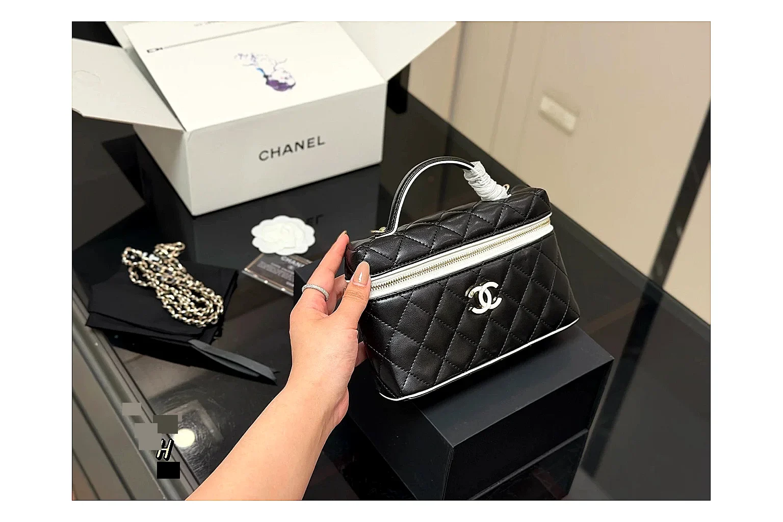 Chanel Wallet On Chain Black shopping brief photo showing black quilted leather wallet body, chain strap, flap closure, and compact shoulder-bag profile