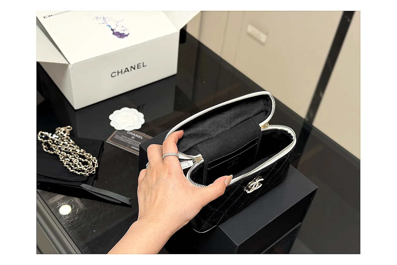 Chanel Wallet On Chain Black shopping brief photo showing black quilted leather wallet body, chain strap, flap closure, and compact shoulder-bag profile thumbnail 2