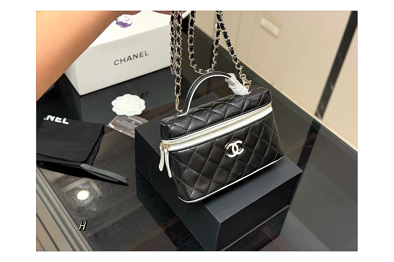 Chanel Wallet On Chain Black shopping brief photo showing black quilted leather wallet body, chain strap, flap closure, and compact shoulder-bag profile thumbnail 4