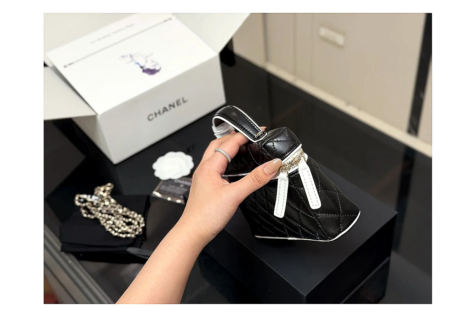 Chanel Wallet On Chain Black shopping brief photo showing black quilted leather wallet body, chain strap, flap closure, and compact shoulder-bag profile thumbnail 6