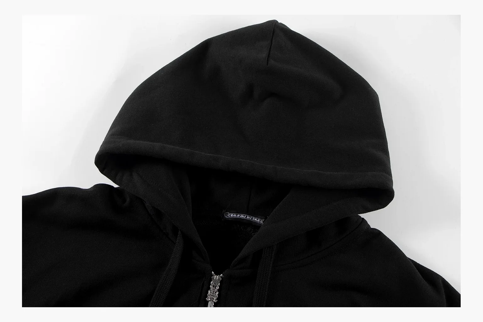 Chrome Hearts Cross Zip Hoodie Black shopping brief photo showing black cotton fleece zip hoodie, large back cross graphic, silver zipper pull, hood drawcords, and front pocket structure thumbnail 5