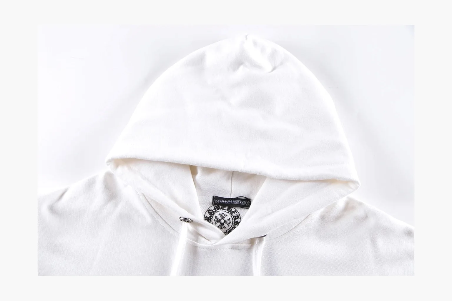 Chrome Hearts White Cross Zip Hoodie shopping brief photo showing white cotton fleece zip hoodie, cross back artwork, drawcord hood, sleeve print, front zipper, and ribbed trim thumbnail 2