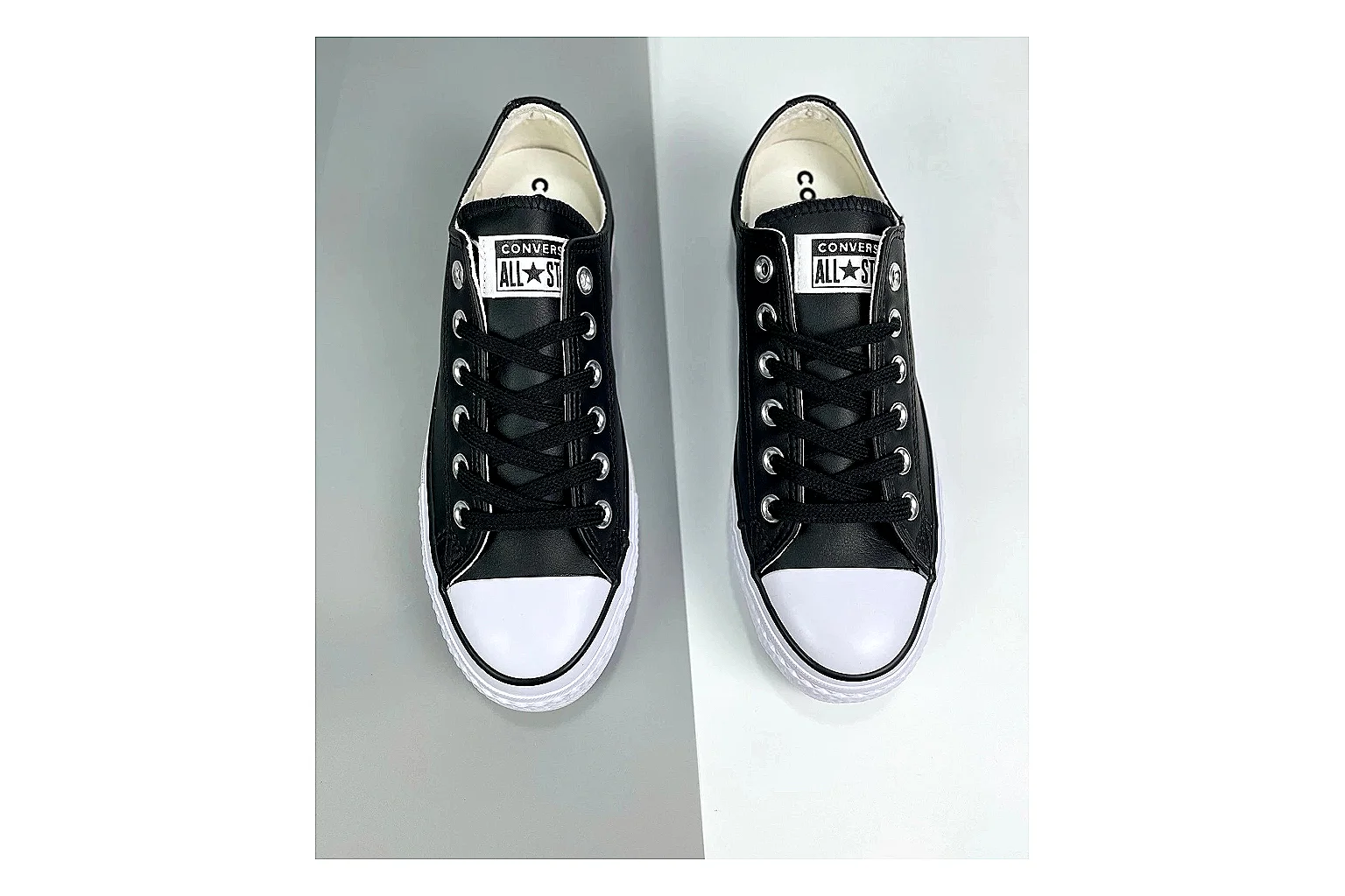 Converse All Star Lift Black Platform Low Top shopping brief photo showing black leather low-top upper, silver eyelets, white rubber toe cap, and elevated striped platform sole thumbnail 5