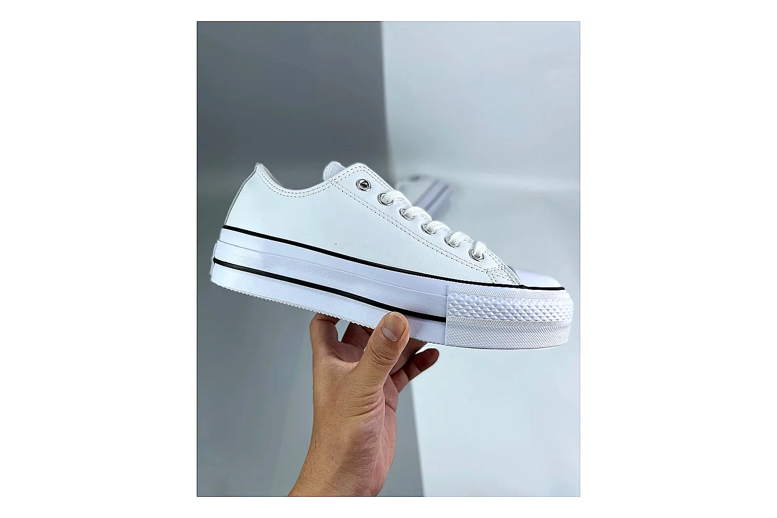 Converse All Star Lift White Platform Low Top shopping brief photo showing white smooth low-top upper, silver eyelets, black foxing stripes, and elevated platform rubber sole thumbnail 4