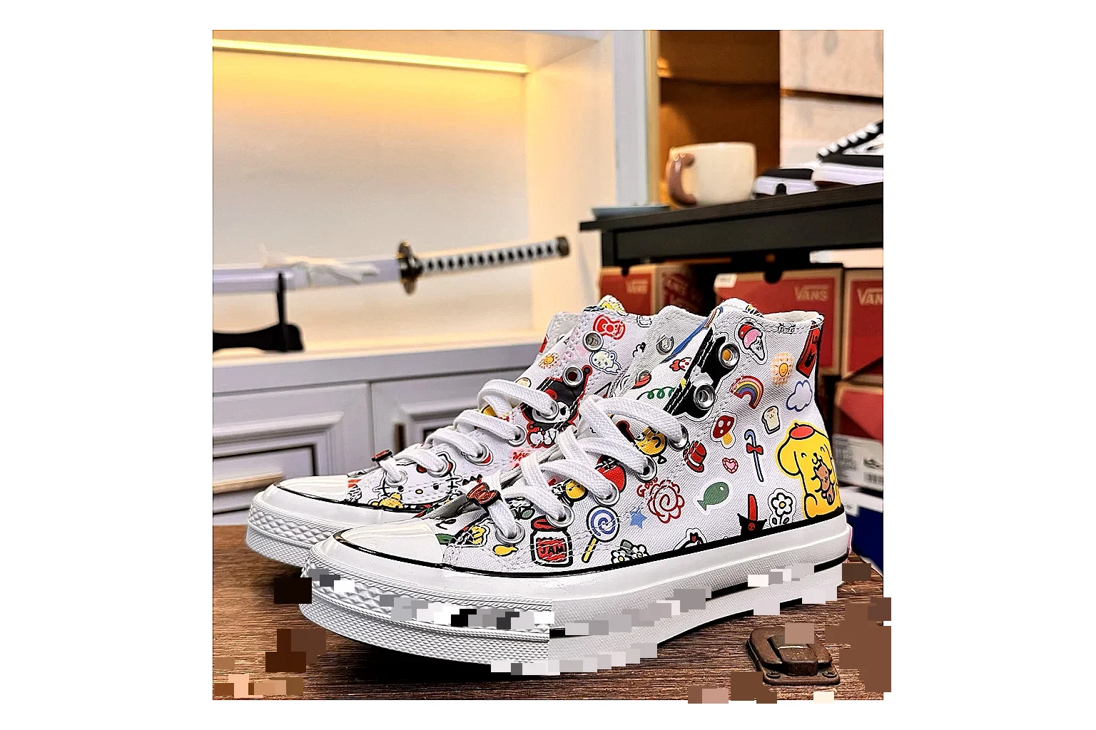 Converse Hello Kitty Chuck 70 High Top shopping brief photo showing white canvas high-top upper, colorful character graphics, metal eyelets, rubber toe cap, and elevated vintage sole