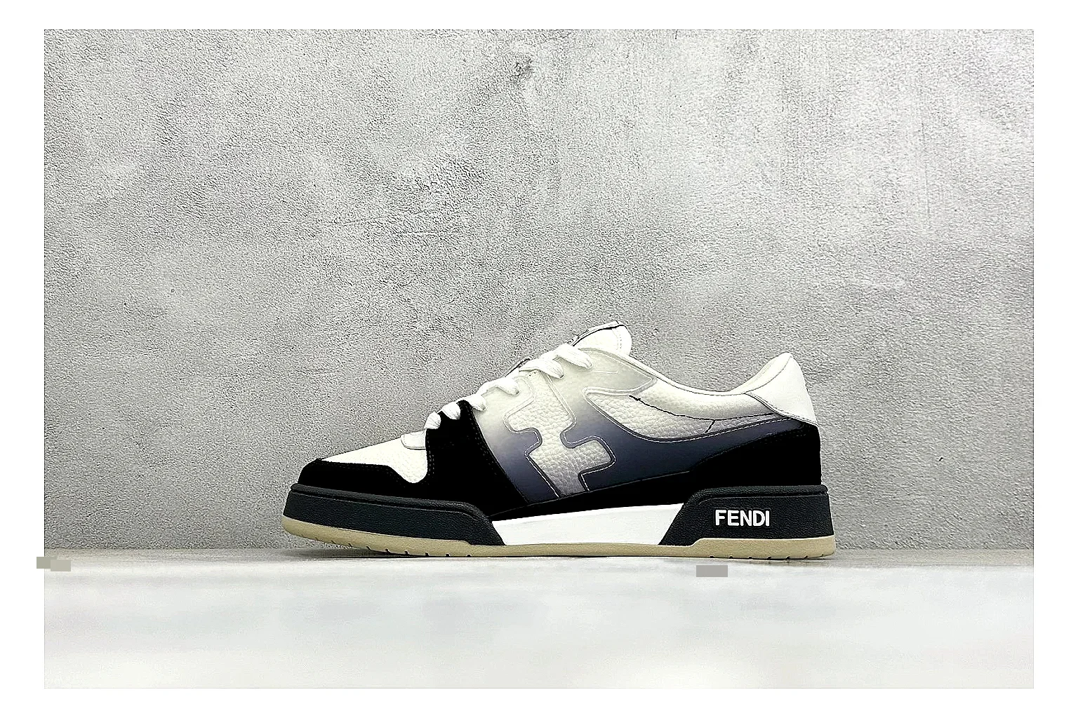 Fendi Match Black White shopping brief photo showing black and white low-top upper, chunky sole, clean panel blocking, and casual designer profile