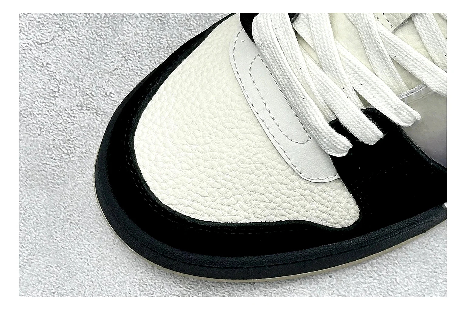 Fendi Match Black White shopping brief photo showing black and white low-top upper, chunky sole, clean panel blocking, and casual designer profile thumbnail 3
