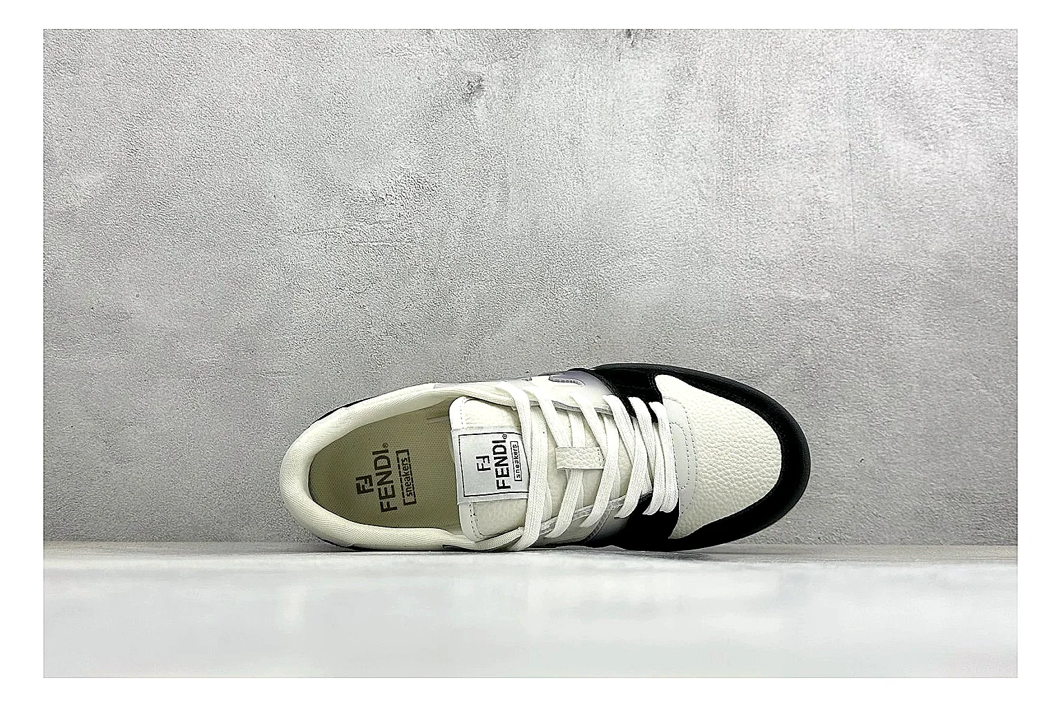 Fendi Match Black White shopping brief photo showing black and white low-top upper, chunky sole, clean panel blocking, and casual designer profile thumbnail 5