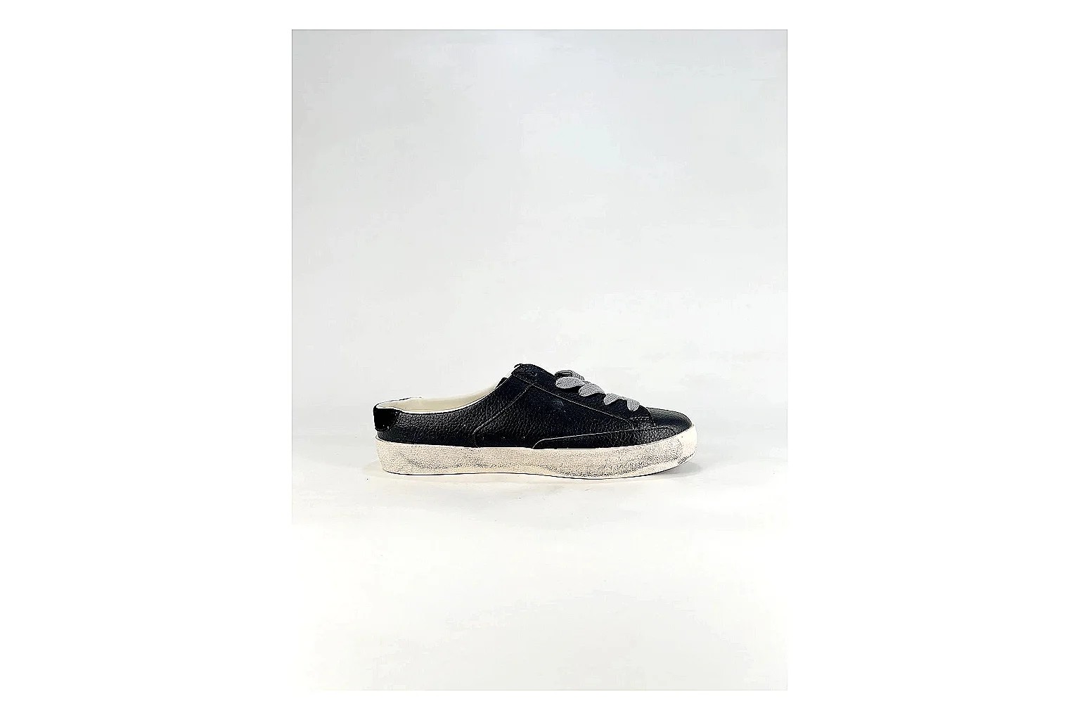 GGDB Super-Star Black White Sneakers shopping brief image showing black white distressed low-top sneakers with leather texture, side-profile shape, upper panel lines, and outsole detail thumbnail 2