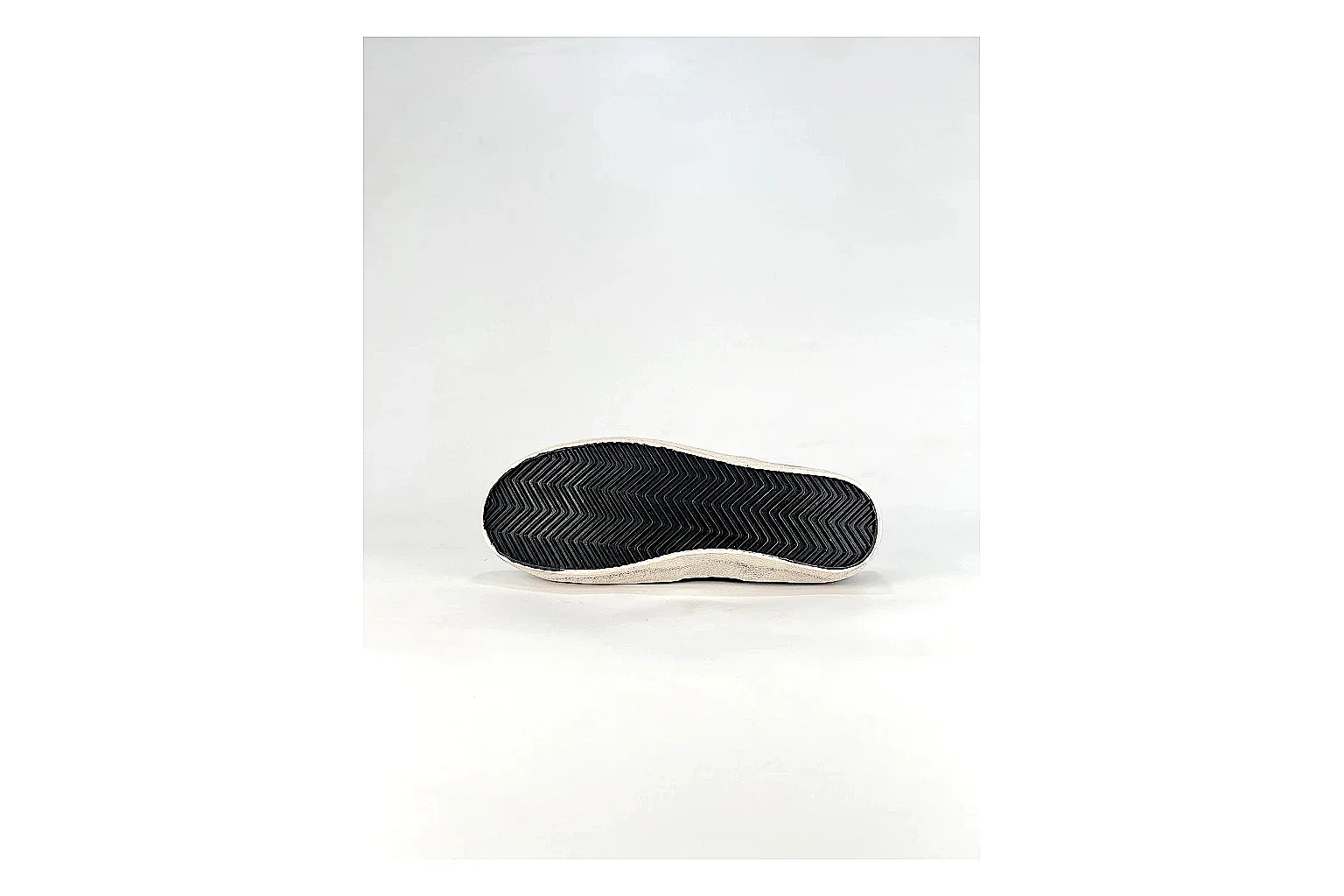 GGDB Super-Star Black White Sneakers shopping brief image showing black white distressed low-top sneakers with leather texture, side-profile shape, upper panel lines, and outsole detail thumbnail 3