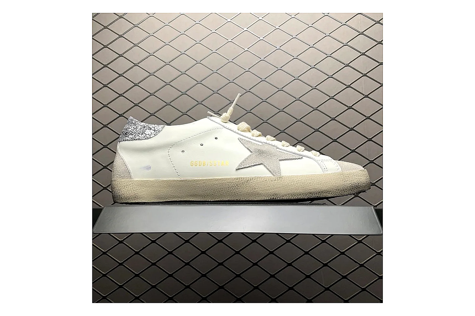 Golden Goose Super-Star White Silver shopping brief image showing white silver gold super-star distressed low-top with mixed upper and low top shape thumbnail 3
