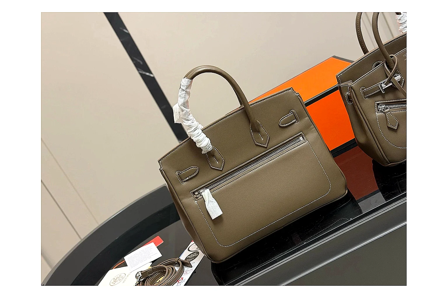 Hermes Birkin Style Olive shopping brief photo showing olive leather structured body, top handles, flap-and-strap shape, and polished hardware thumbnail 3