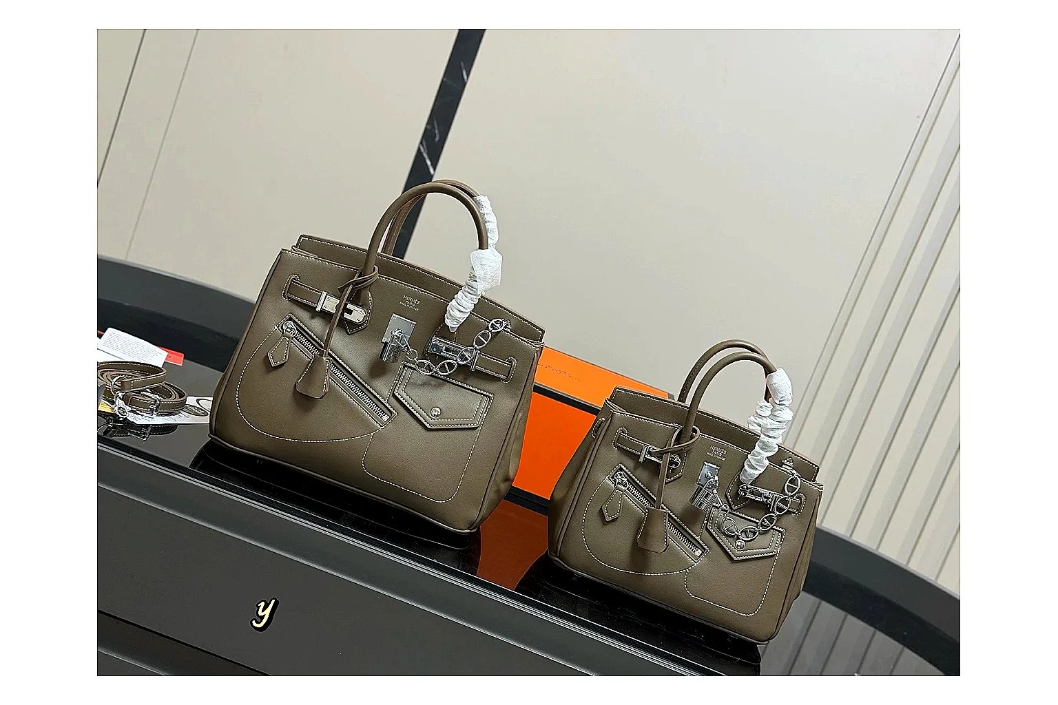 Hermes Birkin Style Olive shopping brief photo showing olive leather structured body, top handles, flap-and-strap shape, and polished hardware thumbnail 4
