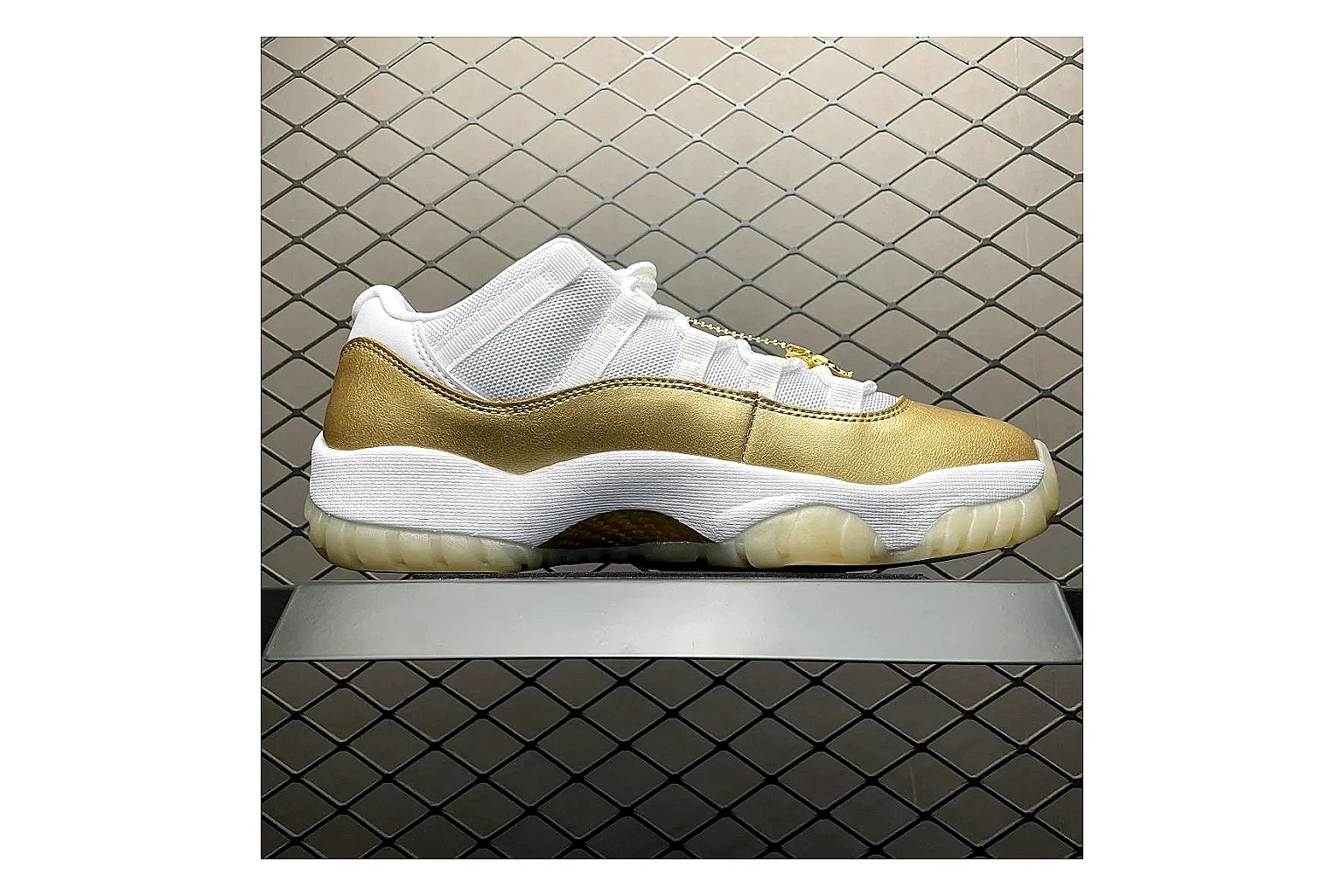 Jordan 11 Low White Gold Sneaker shopping brief image showing white gold aj11 low sneaker with mixed upper and low top shape thumbnail 5
