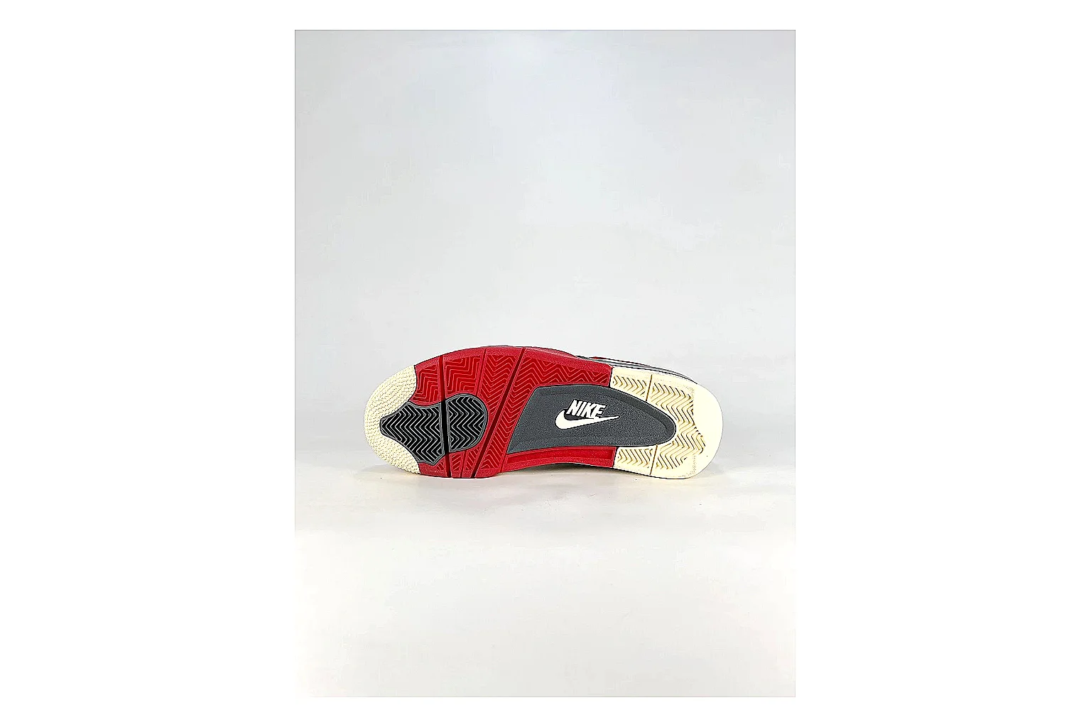 Jordan Air Jordan 4 White Red Sneakers shopping brief image showing white red retro basketball sneakers with leather texture, side-profile shape, upper panel lines, and outsole detail thumbnail 2