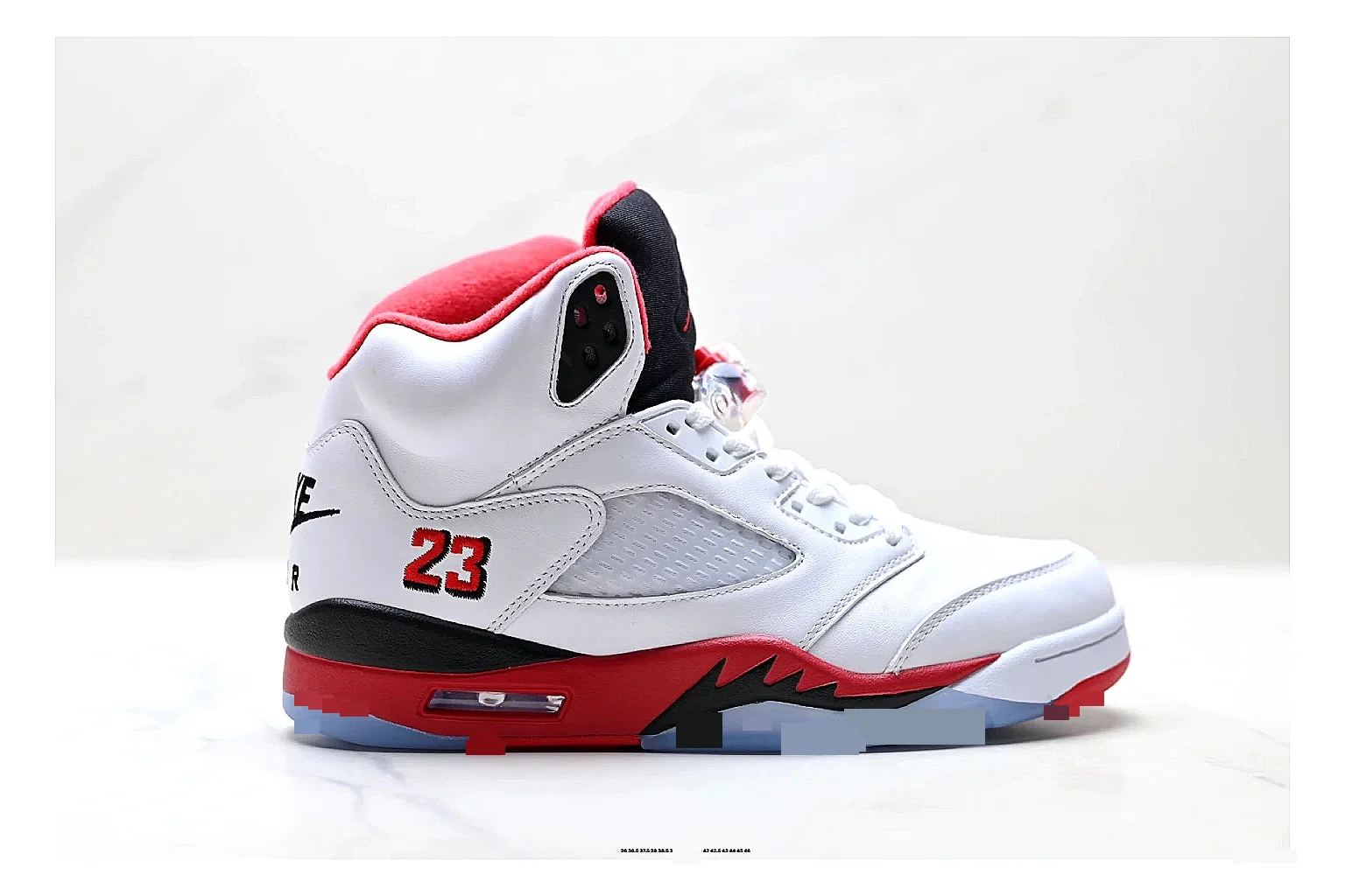 Jordan Air Jordan 5 White Red Sneakers shopping brief image showing white red retro basketball sneakers with leather texture, side-profile shape, upper panel lines, and outsole detail