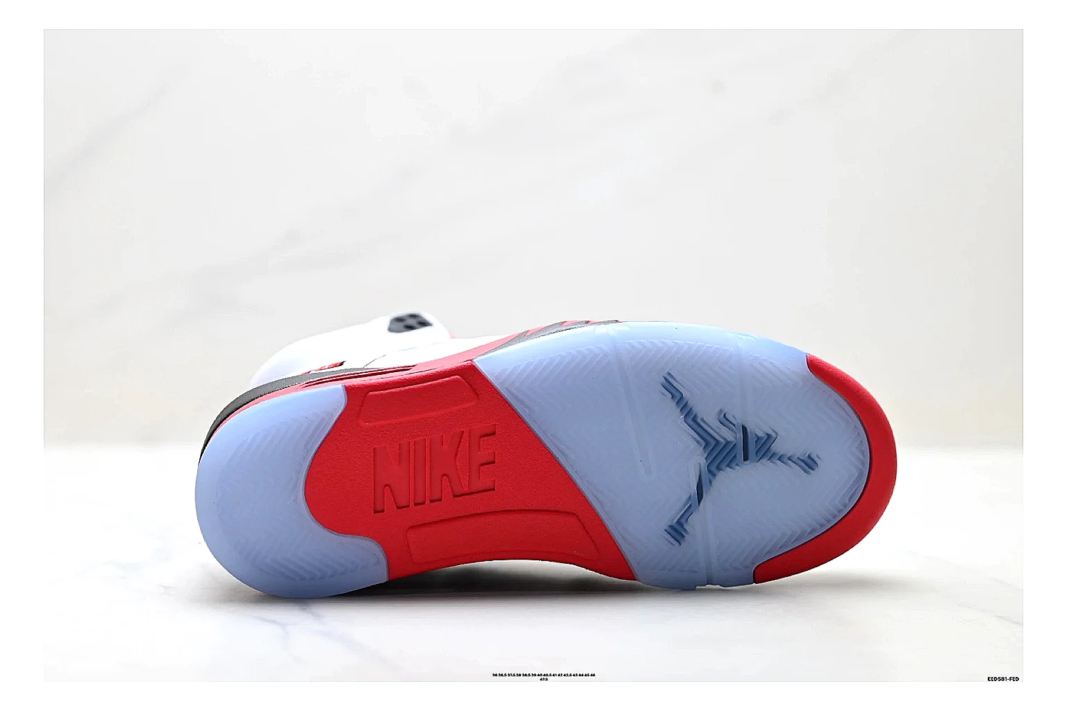 Jordan Air Jordan 5 White Red Sneakers shopping brief image showing white red retro basketball sneakers with leather texture, side-profile shape, upper panel lines, and outsole detail thumbnail 2