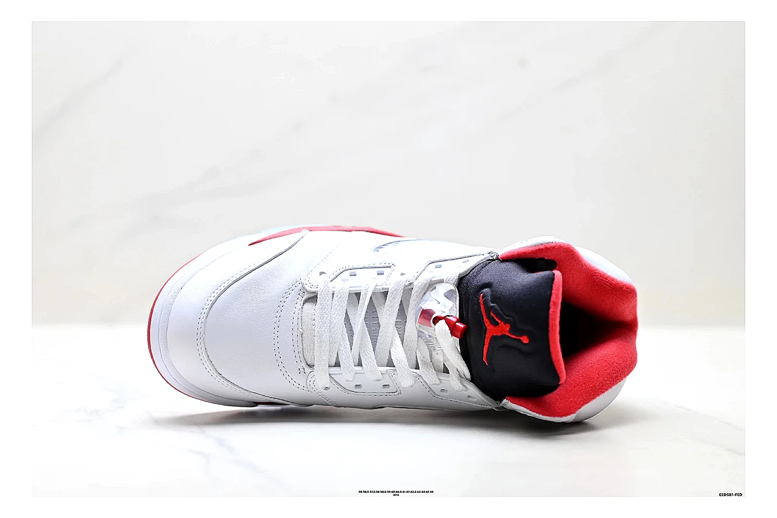 Jordan Air Jordan 5 White Red Sneakers shopping brief image showing white red retro basketball sneakers with leather texture, side-profile shape, upper panel lines, and outsole detail thumbnail 5