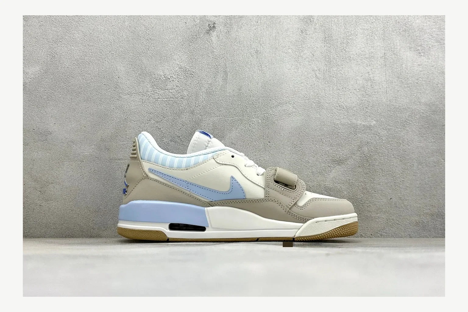 Jordan Air Jordan 4 Blue Sneaker shopping brief image showing white blue air jordan 4 retro with mixed-material upper and low-profile shape