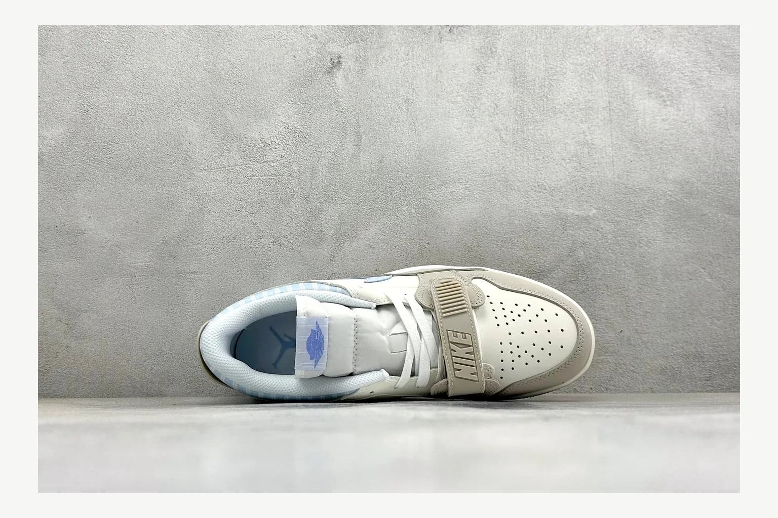 Jordan Air Jordan 4 Blue Sneaker shopping brief image showing white blue air jordan 4 retro with mixed-material upper and low-profile shape thumbnail 5