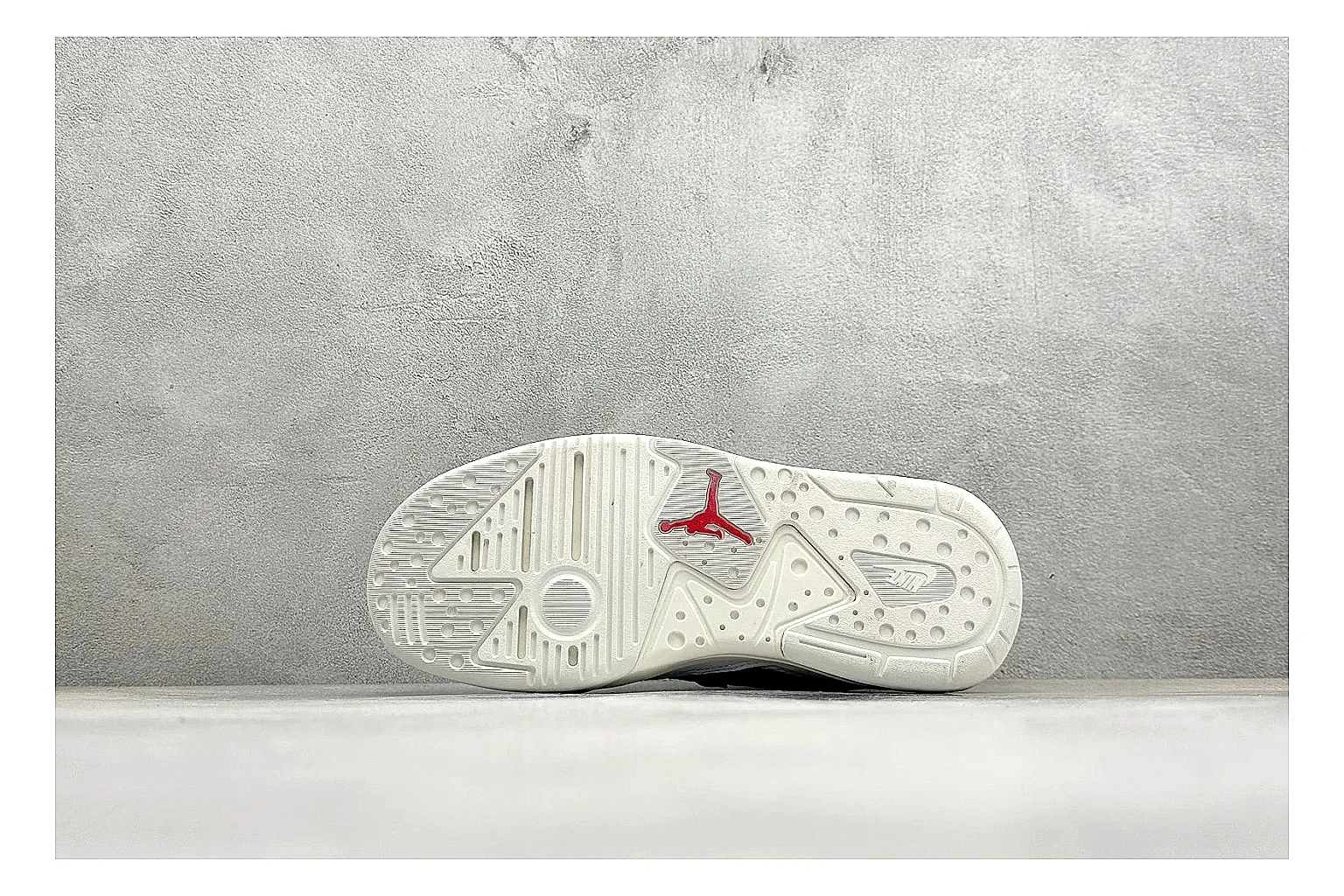 Jordan CMFT White Black shopping brief photo showing white and black layered court panels, red logo detail, low collar, and a clean contrast sole thumbnail 2