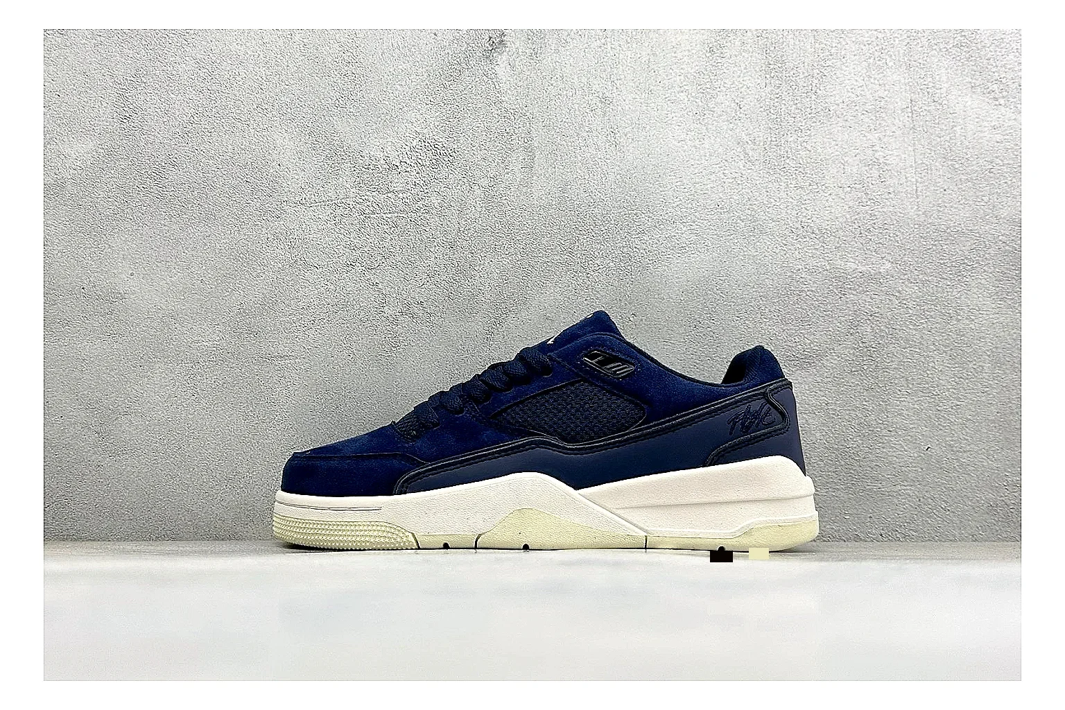 Jordan Flight Navy Suede shopping brief photo showing navy suede upper, low court silhouette, cream sole, and soft retro basketball profile