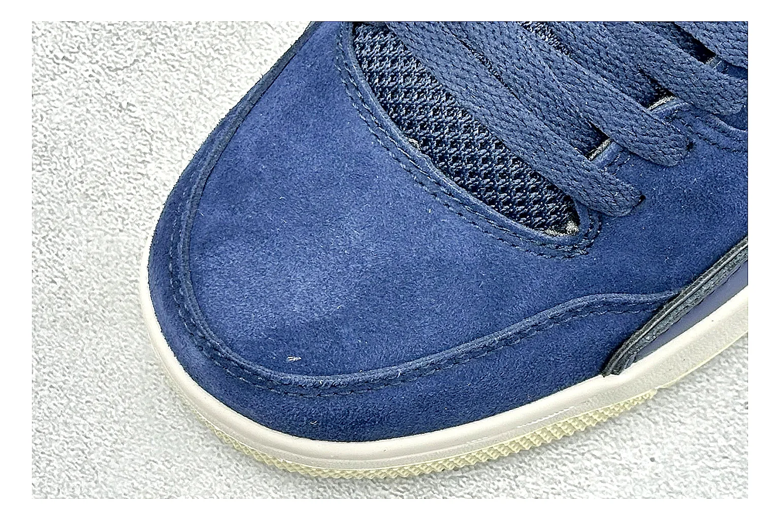 Jordan Flight Navy Suede shopping brief photo showing navy suede upper, low court silhouette, cream sole, and soft retro basketball profile thumbnail 3