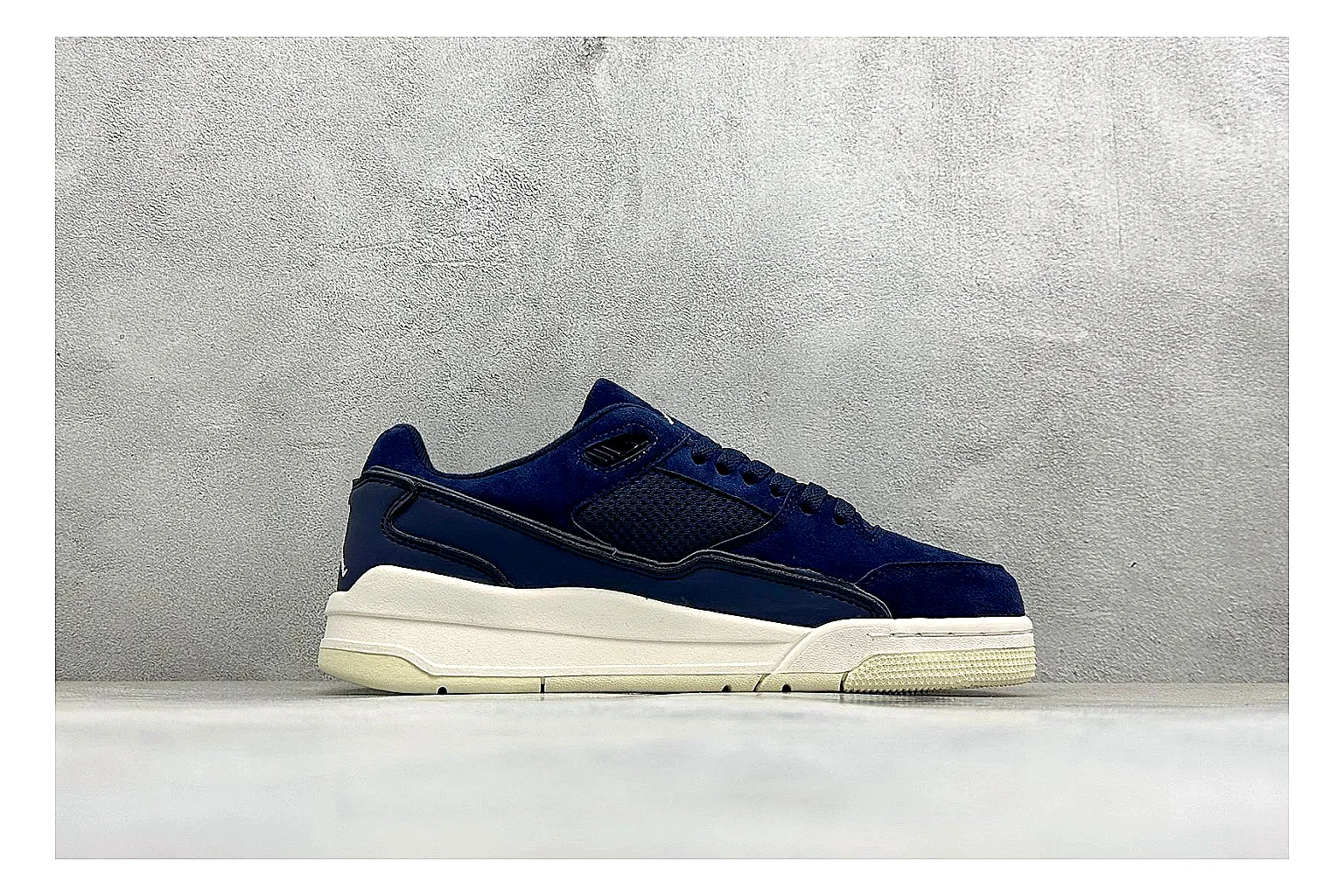 Jordan Flight Navy Suede shopping brief photo showing navy suede upper, low court silhouette, cream sole, and soft retro basketball profile thumbnail 4