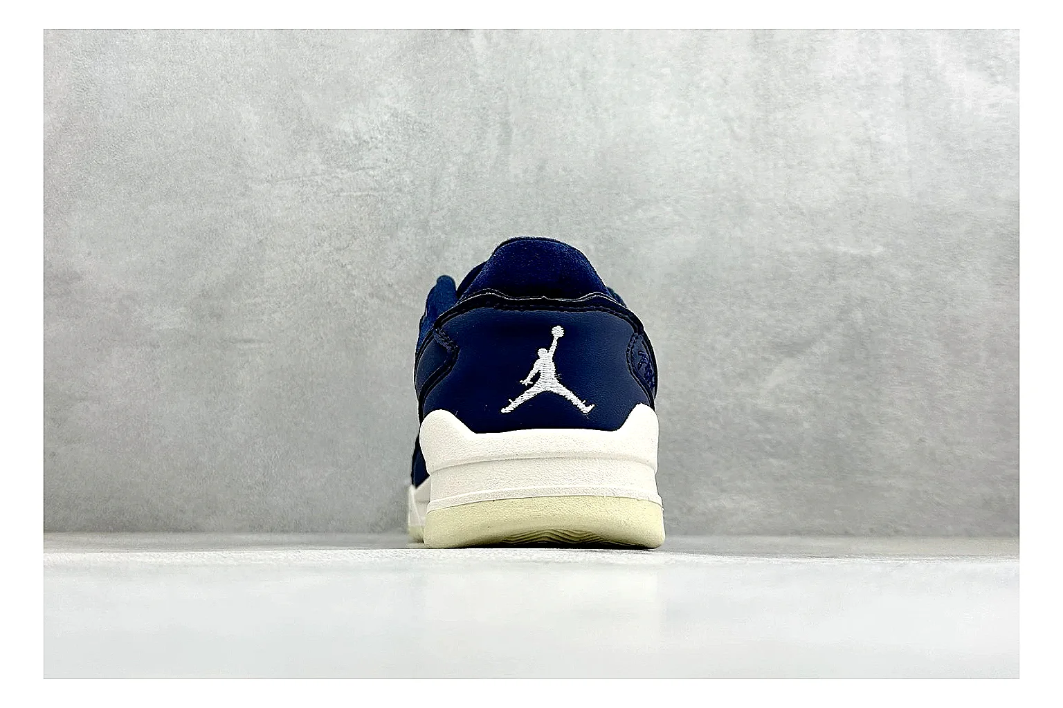 Jordan Flight Navy Suede shopping brief photo showing navy suede upper, low court silhouette, cream sole, and soft retro basketball profile thumbnail 6