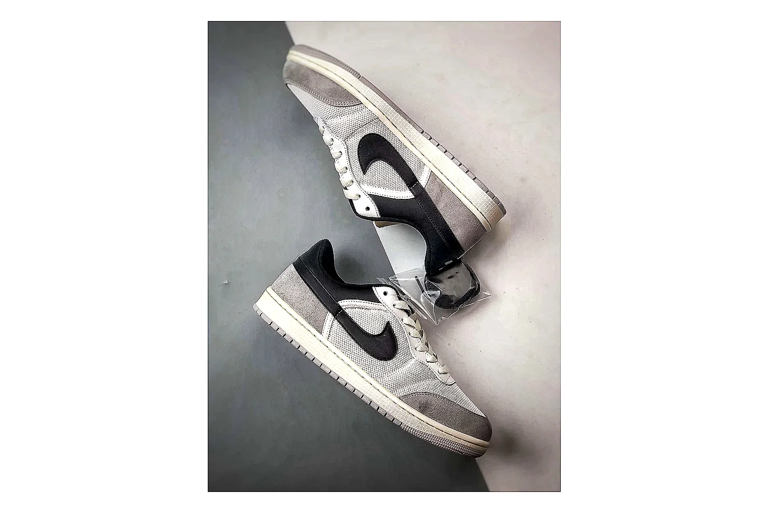 Jordan Low Black White Sneaker shopping brief image showing white black low-top sneaker with mixed-material upper and low-profile shape thumbnail 2