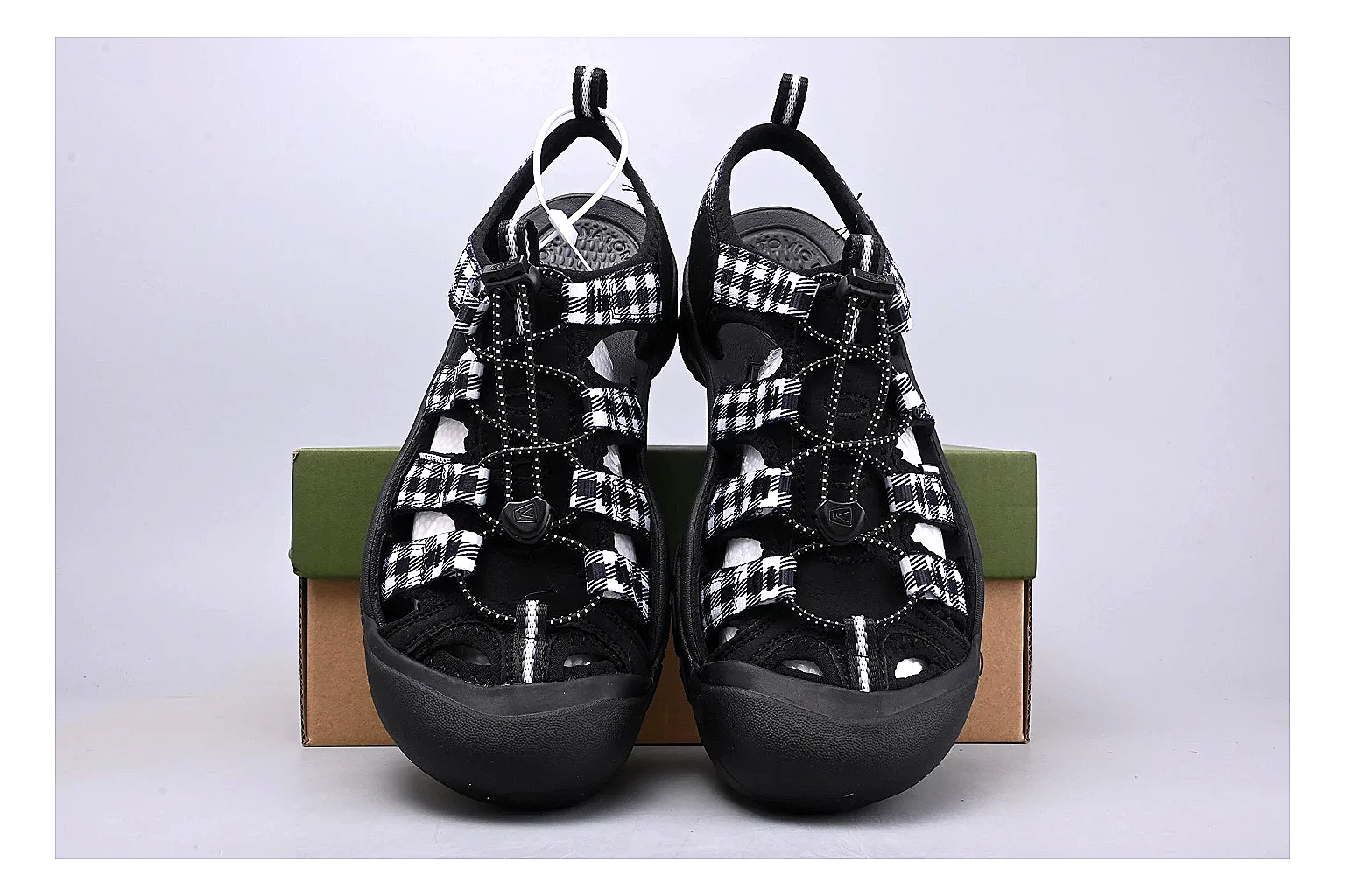 KEEN Zerraport Plaid Sandal shopping brief image showing white black plaid zerraport outdoor sandal with mixed upper and sandal shape thumbnail 2