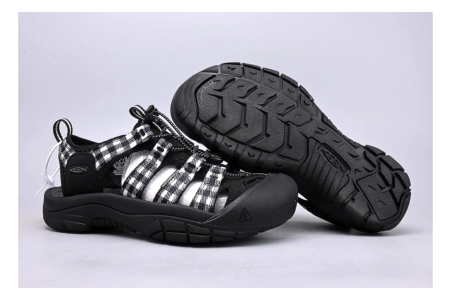 KEEN Zerraport Plaid Sandal shopping brief image showing white black plaid zerraport outdoor sandal with mixed upper and sandal shape thumbnail 3