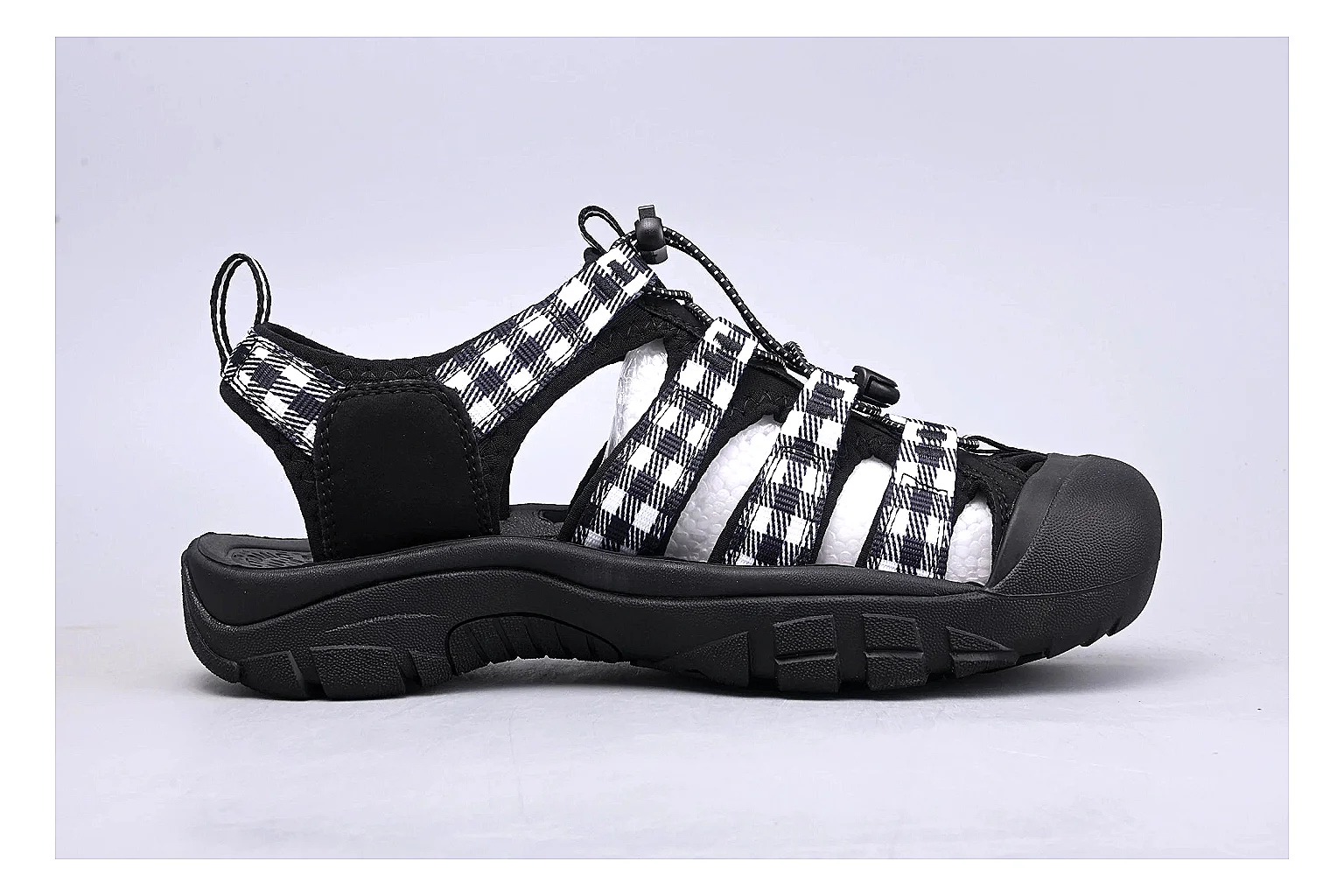 KEEN Zerraport Plaid Sandal shopping brief image showing white black plaid zerraport outdoor sandal with mixed upper and sandal shape thumbnail 4